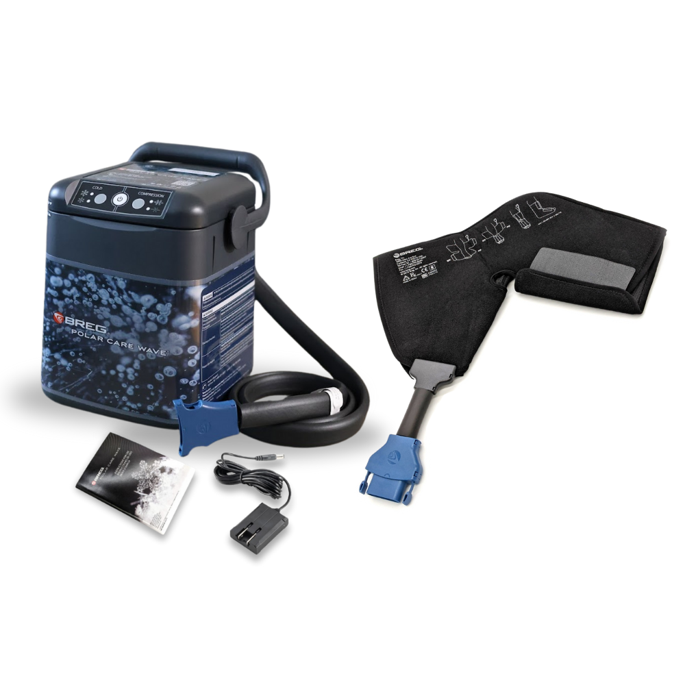 Breg Polar Care Wave cold therapy device with foot and ankle pad, accessories, and instructions.