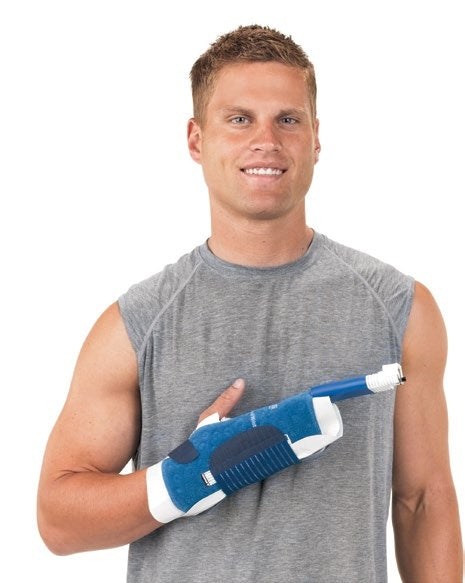 Man wearing Breg Intelli-Flo hand and wrist cold therapy pad, Supply Cold Therapy device