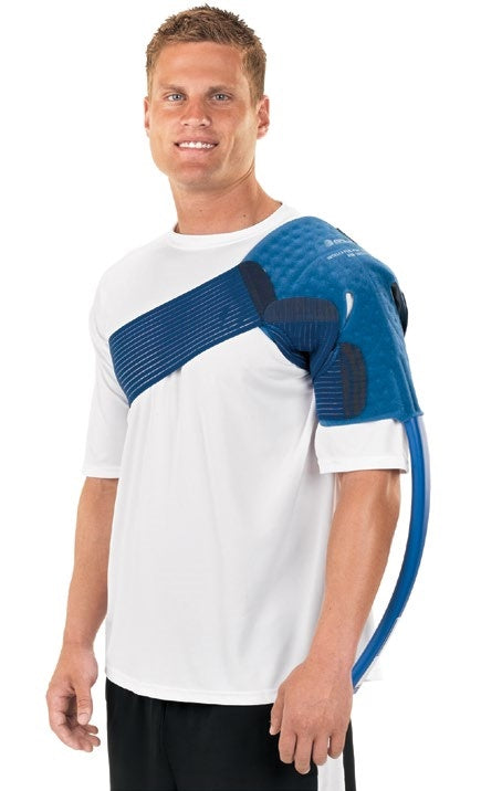 Man wearing Breg Intelliflo cold therapy shoulder pad, shoulder injury recovery device