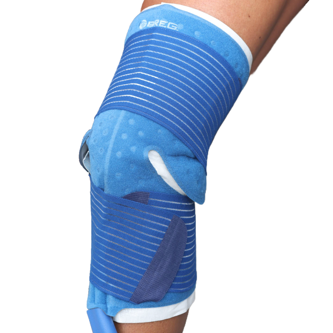 Breg knee cold therapy pad secured on leg, reusable blue wrap for pain relief and recovery